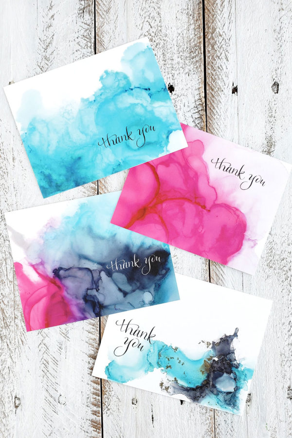 four designs of alcohol ink thank you cards