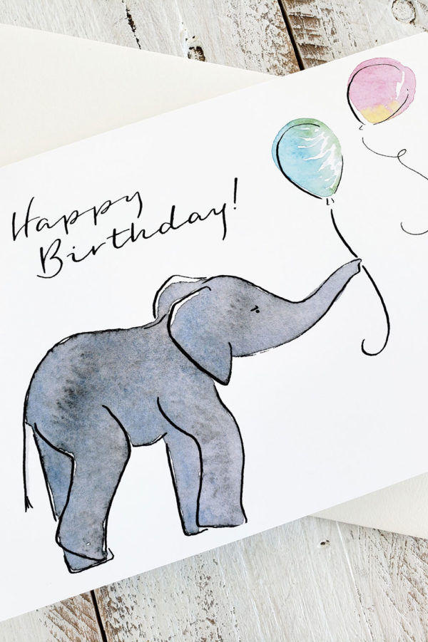 Baby elephant catching balloons birthday card