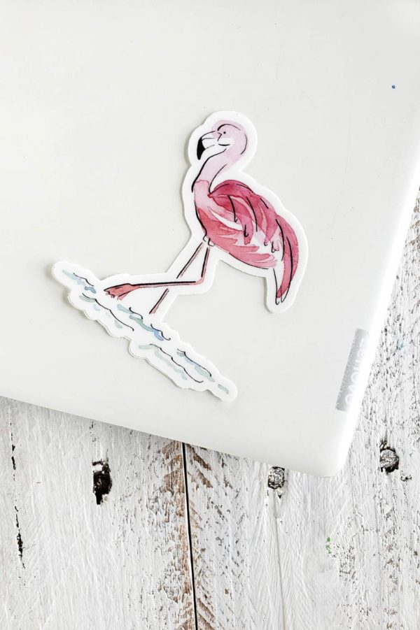 flamingo sticker on laptop