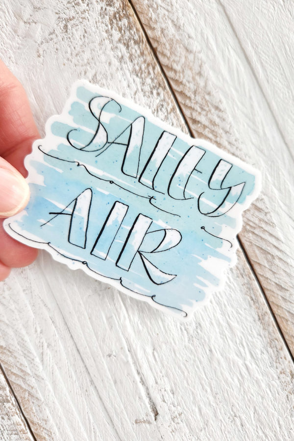 salty air, not a care sticker held