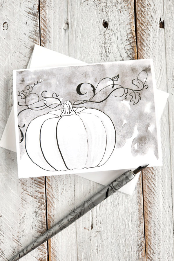 illustrated moody pumpkin and vines greeting card