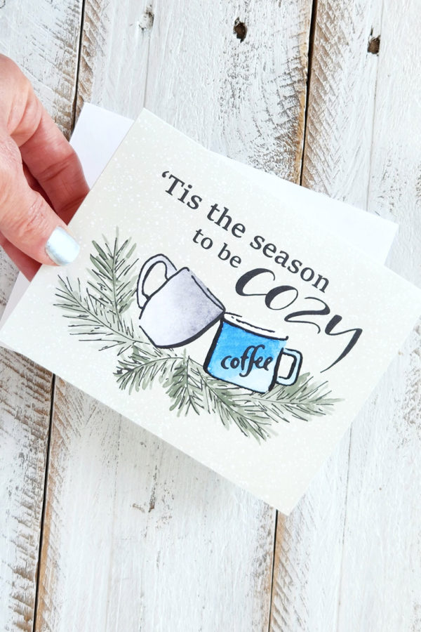 cozy season card held