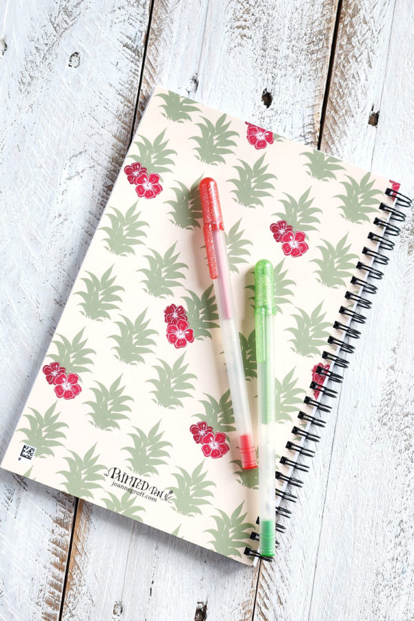 pineapple leaf pattern with hibiscus flowers on the notebook back cover