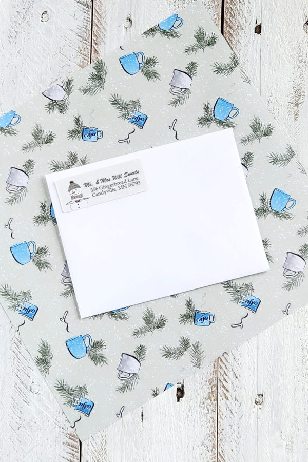 Snowman return address label with wrapping paper