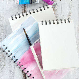 watercolor art journals in different sizes and with different covers