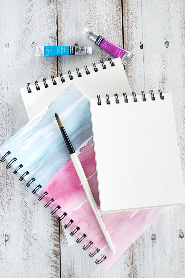 watercolor art journals in different sizes and with different covers