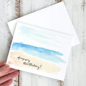 watercolor beach card held