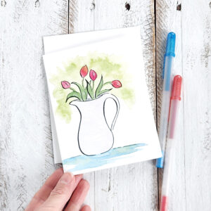 tulips in a pitcher on a greeting card