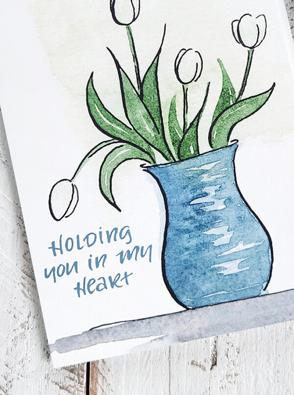 Holding you in my heart tulip sympathy card.